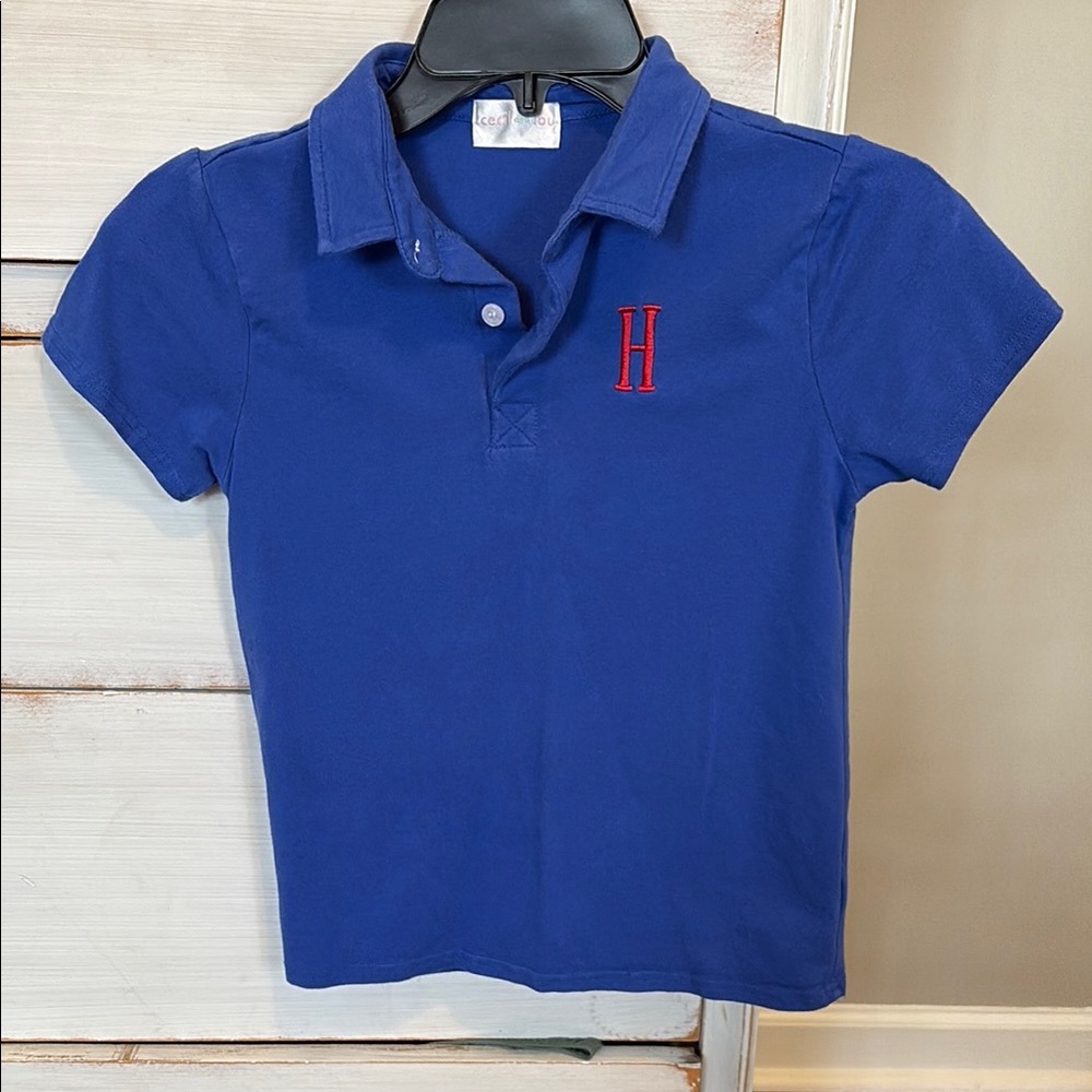 Cecil and Lou Blue Polo Shirt with Red H monogram